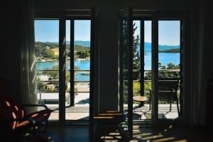 a room with a view of a body of water at Agava in Lovište