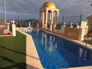 Bazén v ubytování Aguilas Paraiso nebo v jeho okolí