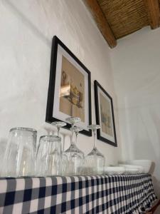 a group of wine glasses sitting on a table at Kamara since 1900 in Archangelos