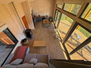 an overhead view of a living room in a house at AvA Refugios Malalcahuello in Malalcahuello