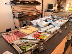 a buffet line with many different types of food at Pension Klatovy in Klatovy
