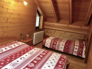 Кровать или кровати в номере Maison Giulietta