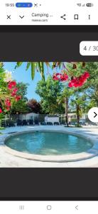 a screenshot of a picture of a swimming pool at Le petit paradis de la roque d'antheron in Jean-Jean