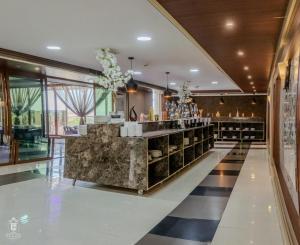 a lobby of a hotel with a bar at La Zona Continental Hotel in Dubai