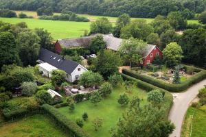 an aerial view of a house with a yard at B&B Olsegården in Tvååker