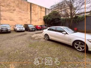 a group of cars parked in a parking lot at Noth Central in Osorno