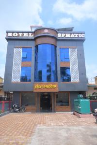 a building with a sign on the front of it at Hotel sphatic in Chitrakoot