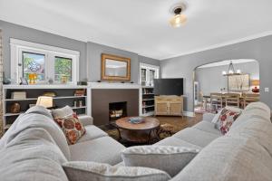 a living room with a couch and a fireplace at Your Chicago Retreat in Chicago