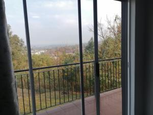 a view from the window of a balcony at Your Exclusive PMB Escape in Pietermaritzburg