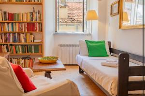 a living room with a couch and a table at Authentic and Charming apartments between Cinque Terre and Portofino - Velva House in Velva
