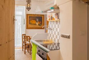 a kitchen with a sink and a counter top at Authentic and Charming apartments between Cinque Terre and Portofino - Velva House in Velva