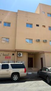 a white van parked in front of a building at Sweet Sbah in Hail