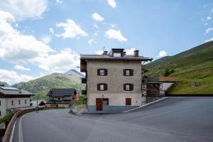 a building on the side of a road at The WoodHouse in Livigno