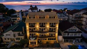 an aerial view of a building with lights at Boeme88 in Eforie Sud