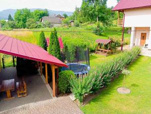 an overhead view of a garden with a hot tub at Котедж in Yaremche