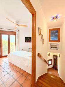a bedroom with a bed and a fireplace at Casa luminosa con encanto in Vélez-Rubio