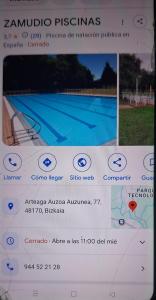 a computer screen with a picture of a swimming pool at Hotel Artea Errota in Zamudio