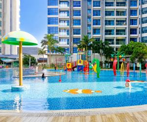 a water park in a city with a playground at Atlantis Residences by UVM Stay -4 Pax in Malacca