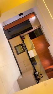 an overhead view of a kitchen in a house at Ayden Residence Béjaïa in Bejaïa
