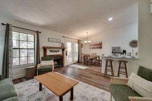 a living room with a couch and a table at Ozark Mountain Refuge in Kimberling City