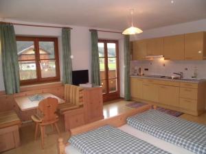 TV a/nebo společenská místnost v ubytování Appartements Färberhof