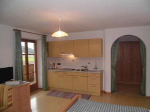 Kuchyň nebo kuchyňský kout v ubytování Appartements Färberhof + 28 fotografií
