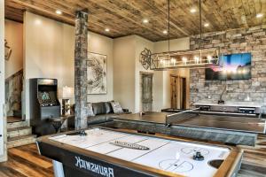 a kitchen with a large island in a living room at Million Dollar Mountain Views in Gatlinburg