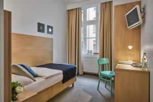 Postel nebo postele na pokoji v ubytování Hotel 38