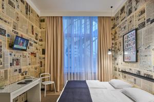 TV a/nebo společenská místnost v ubytování Hotel 38