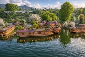 an aerial view of a river with several boats at Floating Luxury Group Of Houseboats in Srinagar