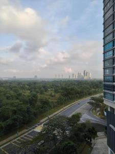 a view of a road in a city with buildings at Teega Suite - 5 mins from Legoland in Nusajaya