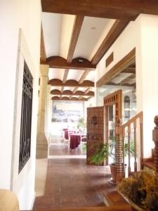 
a very nice looking room with a large window at Hotel Casas del sevillano in El Tornadizo
