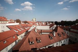 a view of roofs of buildings in a city at LH Vintage Design Hotel Sax in Prague