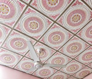 a ceiling with a clock on top of it at Cozy Comfy 2 in Hithadhoo