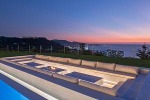 a hot tub sitting on the side of a house at Monte Smith Luxury Villas in Rhodes Town +110 photos