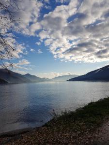 a view of a lake with mountains in the background at Il Nido in Gravedona +4 photos