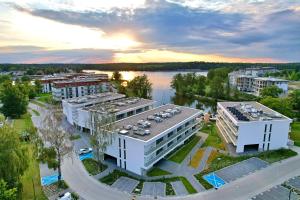an aerial view of a city with buildings and a river at Apartament Lake Mood Iława in Iława
