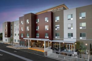 a rendering of a hotel with a building at TownePlace Suites by Marriott Palmdale in Palmdale