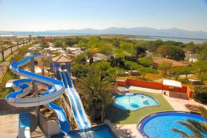 an aerial view of a water park with a water slide at Lesoleil in Canet-en-Roussillon