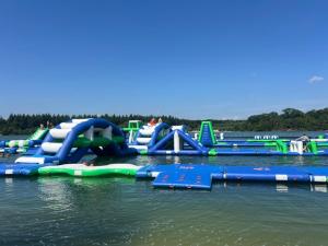 a water park with a bunch of slides in the water at Ibiza style chalet in Eext