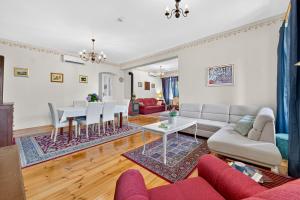 a living room with a couch and a table at VILLA Mara in Dubravka +46 photos