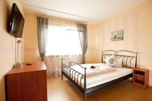 Lova arba lovos apgyvendinimo įstaigoje Hotel jasmin