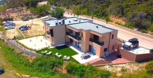 an aerial view of a house at Paradiso Beach House in Lopar