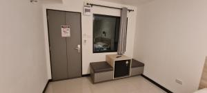 a room with a box in the corner of a room at ห้องพัก168 in Ban Amphaeng