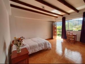 Llit o llits en una habitació de Casita Chimpay