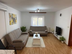 Prostor za sedenje u objektu MS Apartment