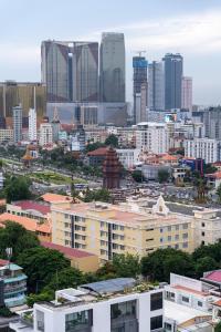a view of a city with tall buildings at Champs Elysees Hotel & Suites in Phnom Penh