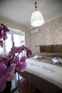 Postel nebo postele na pokoji v ubytování A Casa di Benny