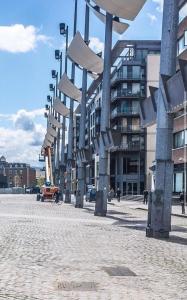 a row of street lights in front of a building at The Central Dublin Hostel in Dublin