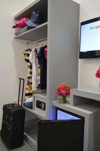 A television and/or entertainment centre at Room 91-S. Peter